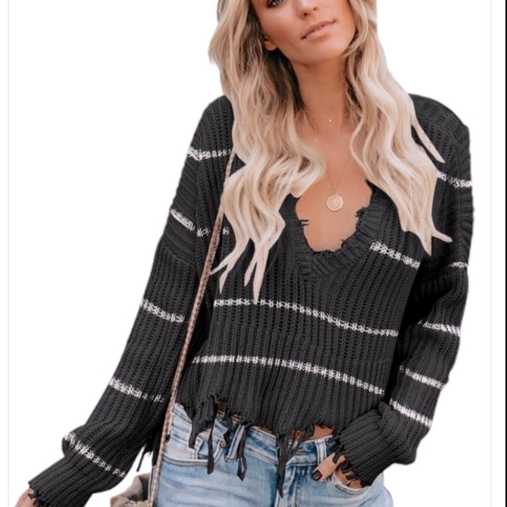 108. Andree by Unit Distressed V Neck Raw Hemline Sweater